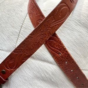 Fossil brand butterfly embossed leather belt.